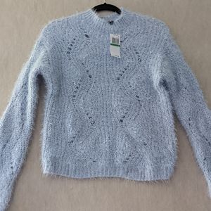 Light blue sweater